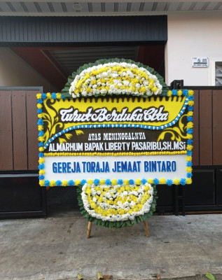 Papan Bunga Duka di Kebun Handil